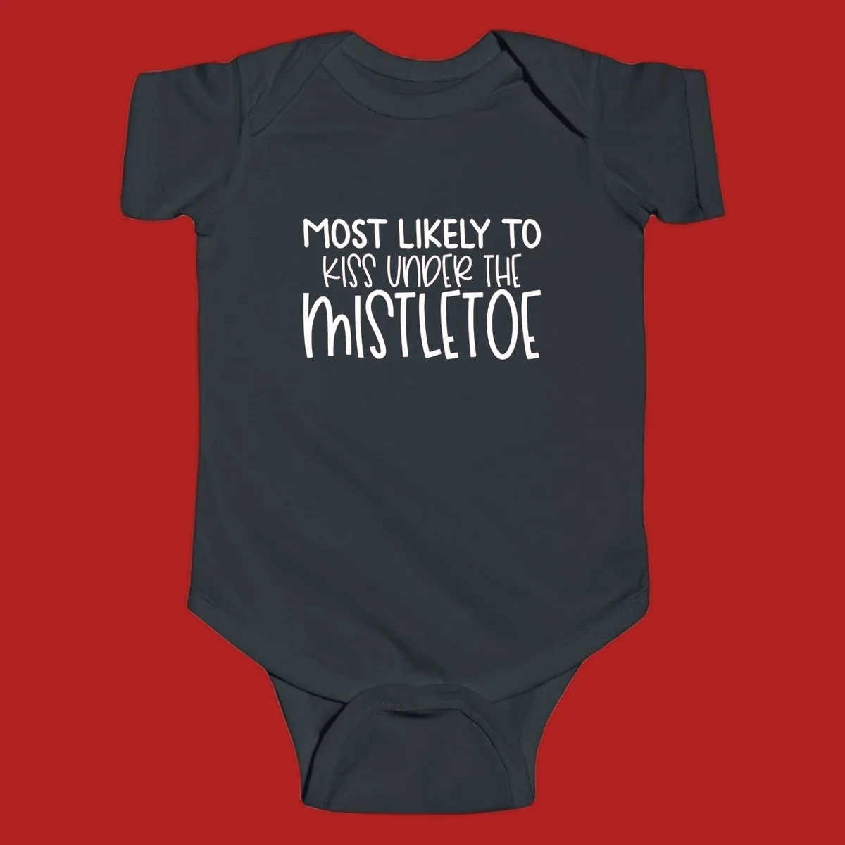Typography design with the phrase 'Most Likely To Kiss Under Mistletoe' in white.