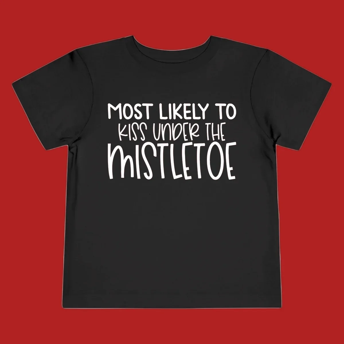 Typography design with the phrase 'Most Likely To Kiss Under Mistletoe' in white.