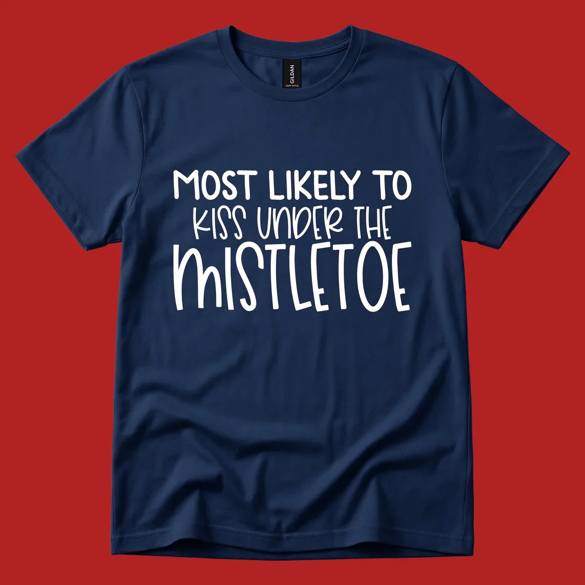 Typography design with the phrase 'Most Likely To Kiss Under Mistletoe' in white.
