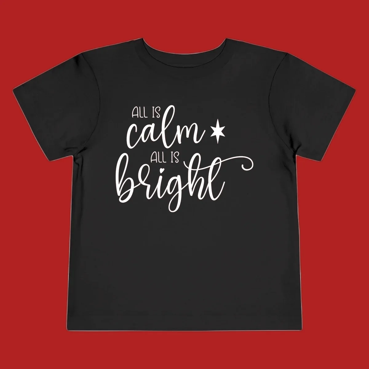 Elegant white script text 'All Is Calm All Is Bright' with star and heart, holiday design.