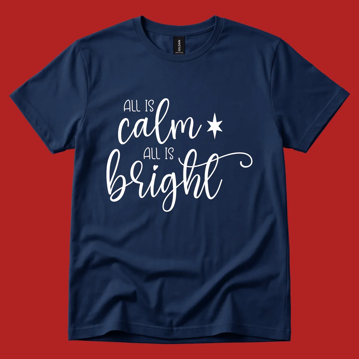 Elegant white script text 'All Is Calm All Is Bright' with star and heart, holiday design.