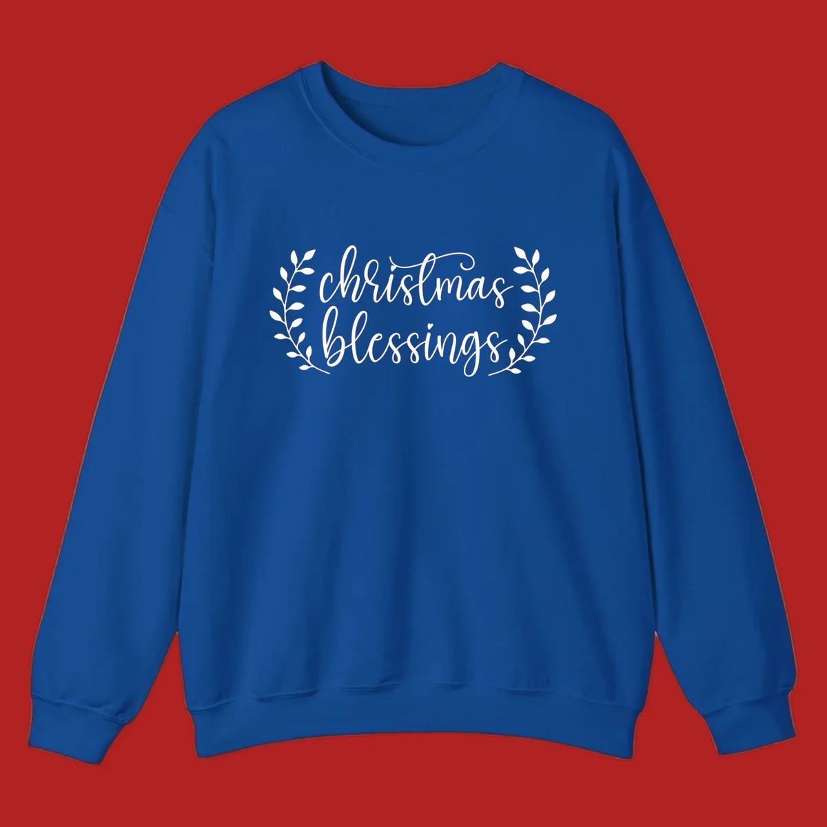 Christmas blessings text with leafy branches accent.