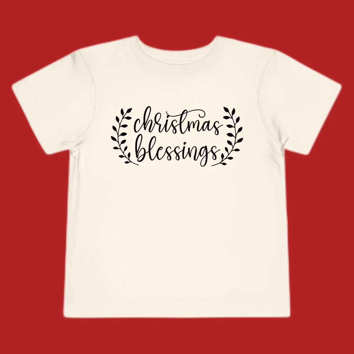 Christmas blessings text with leafy branches accent.