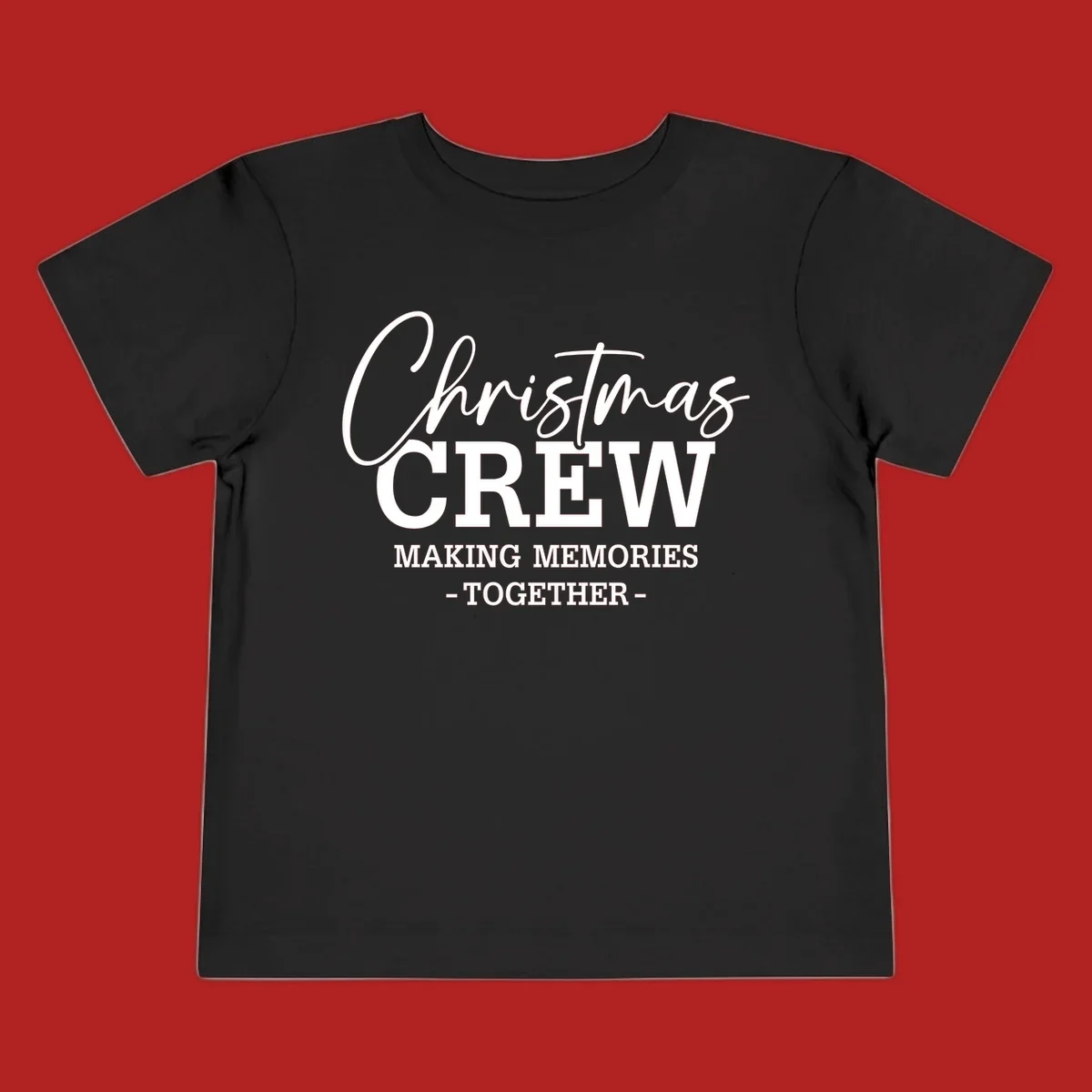 Christmas Crew Making Memories Together typography design on a dark background.