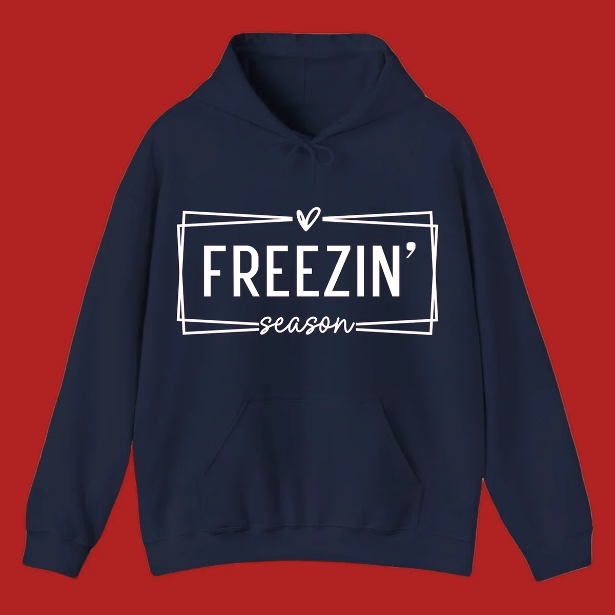 Freezin' Season text design with heart icon and border, for winter holidays.