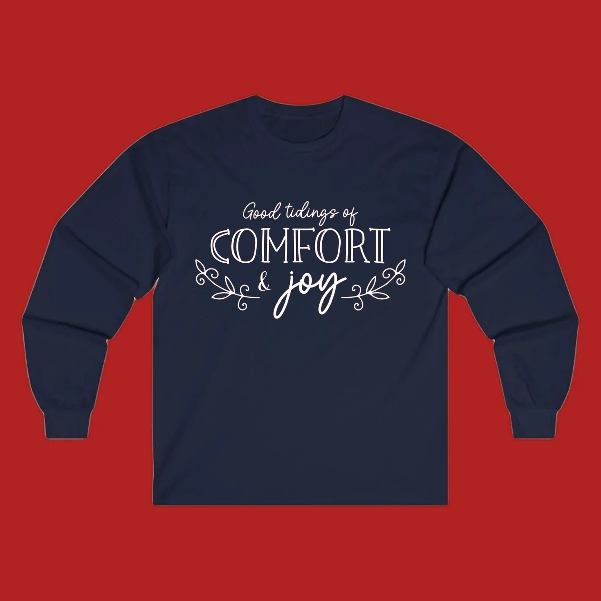 Good tidings of comfort and joy holiday text design with floral accents.