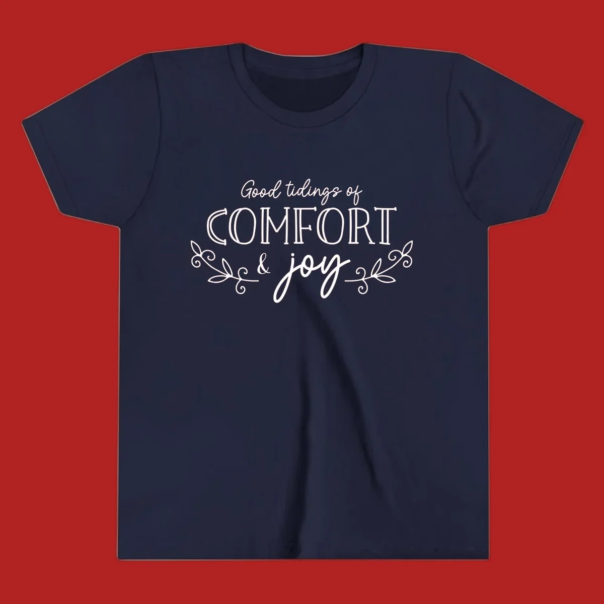 Good tidings of comfort and joy holiday text design with floral accents.