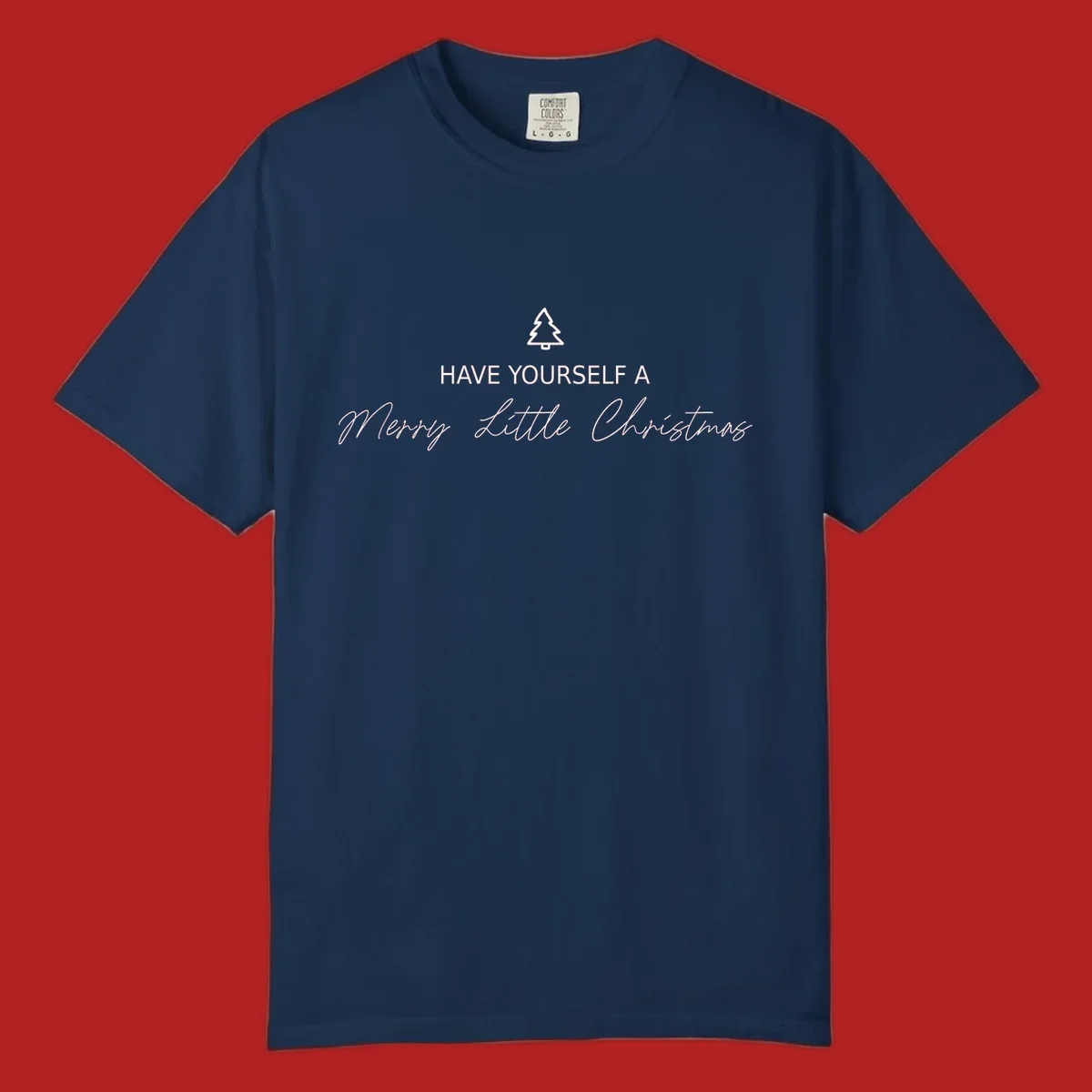 Typography design with a Christmas tree and the phrase 'Have Yourself A Merry Little Christmas' in script and block letters.