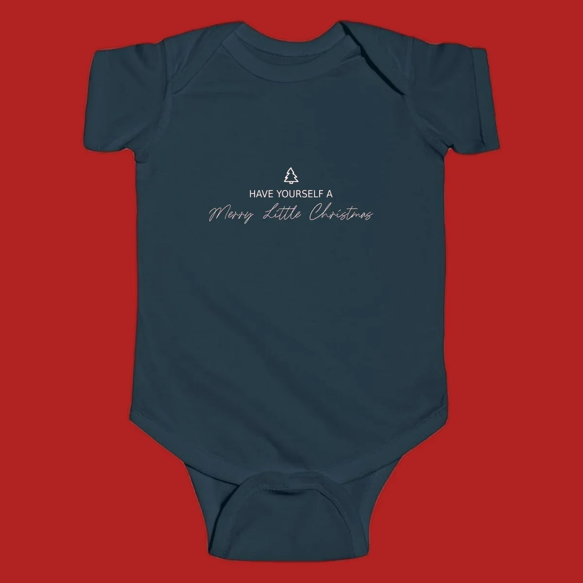 Typography design with a Christmas tree and the phrase 'Have Yourself A Merry Little Christmas' in script and block letters.