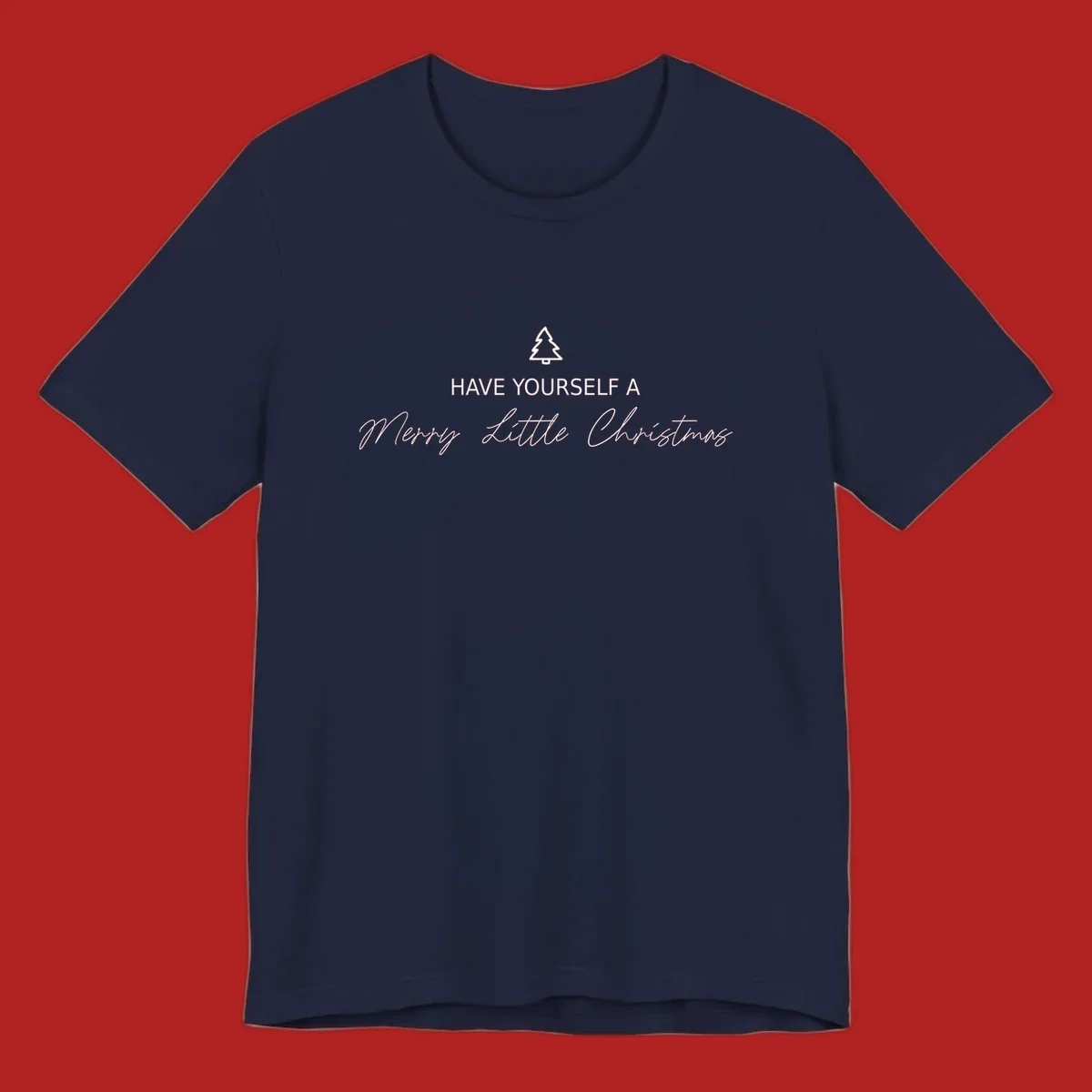 Typography design with a Christmas tree and the phrase 'Have Yourself A Merry Little Christmas' in script and block letters.