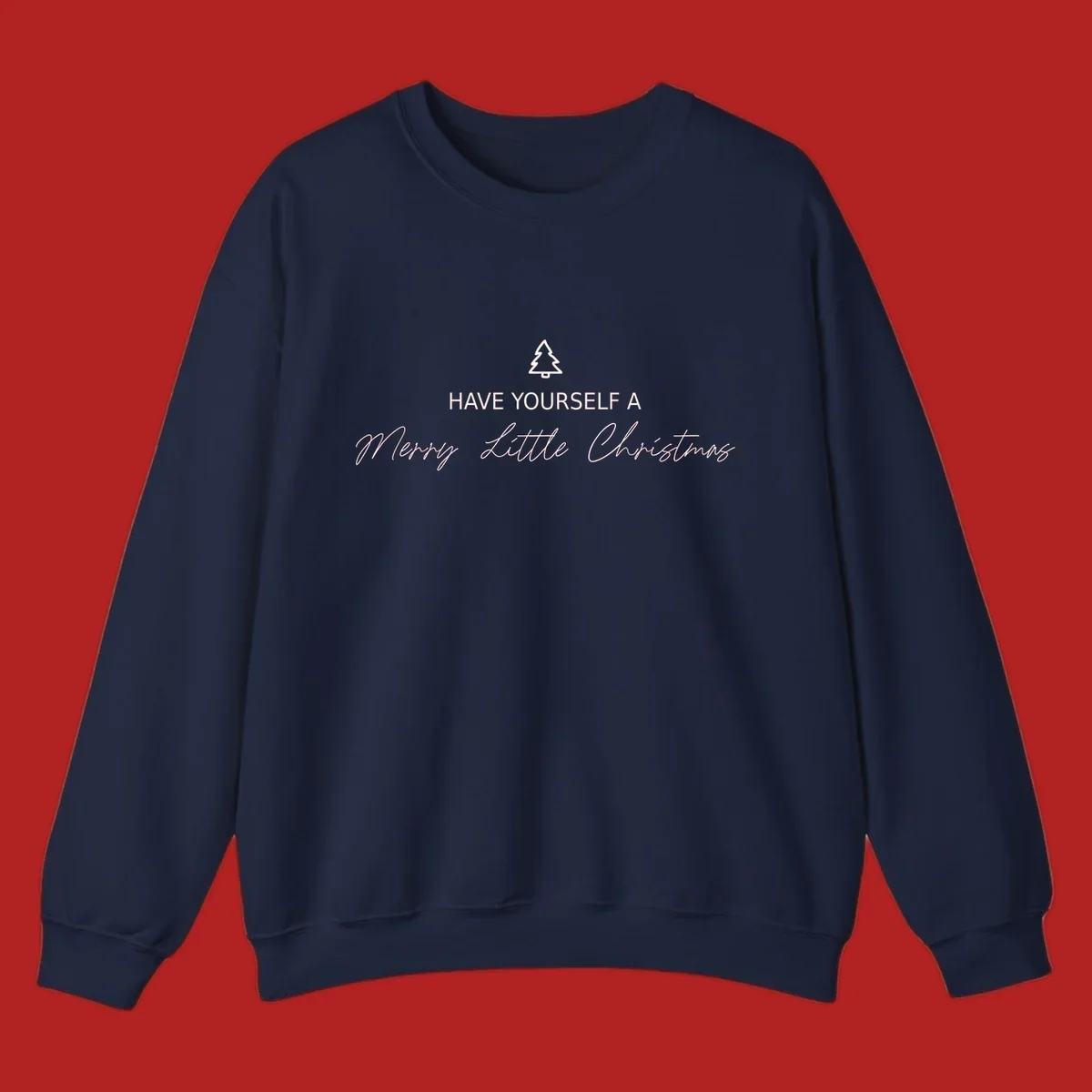 Typography design with a Christmas tree and the phrase 'Have Yourself A Merry Little Christmas' in script and block letters.