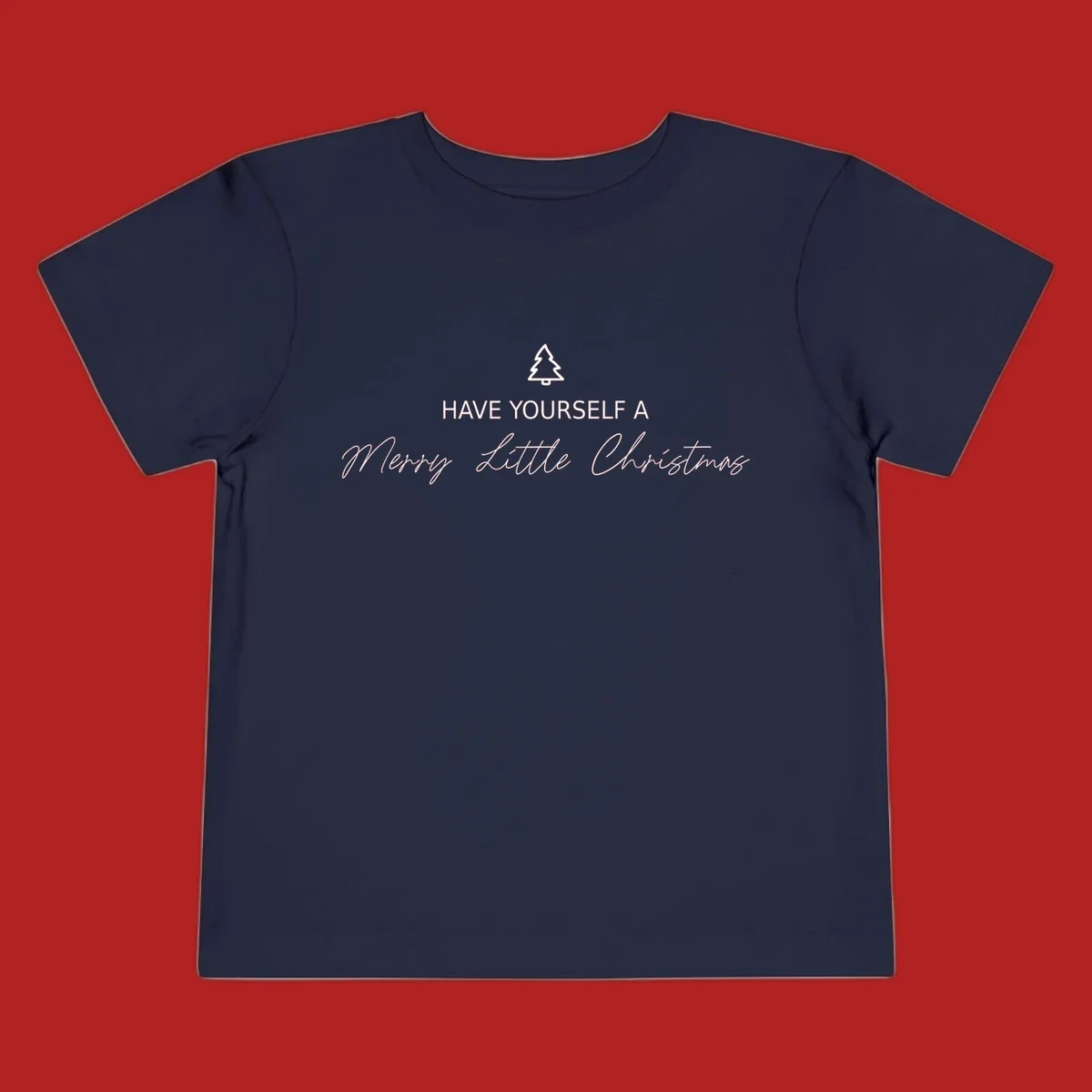 Typography design with a Christmas tree and the phrase 'Have Yourself A Merry Little Christmas' in script and block letters.