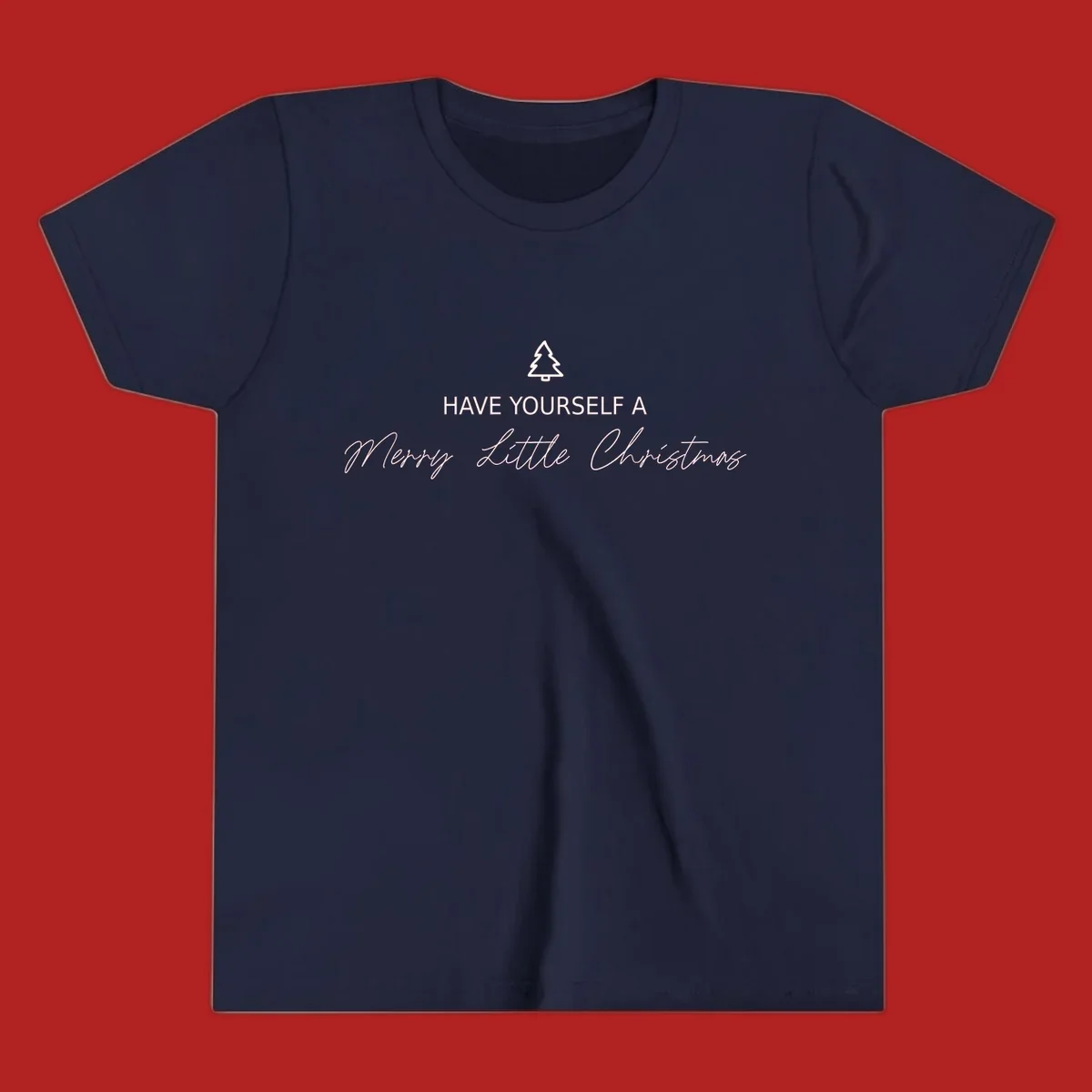 Typography design with a Christmas tree and the phrase 'Have Yourself A Merry Little Christmas' in script and block letters.
