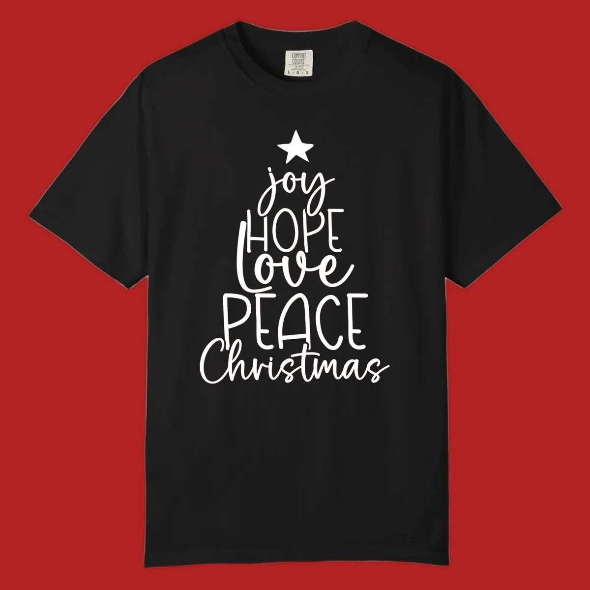 Christmas tree made of words joy, hope, love, peace, and Christmas with a star on top.