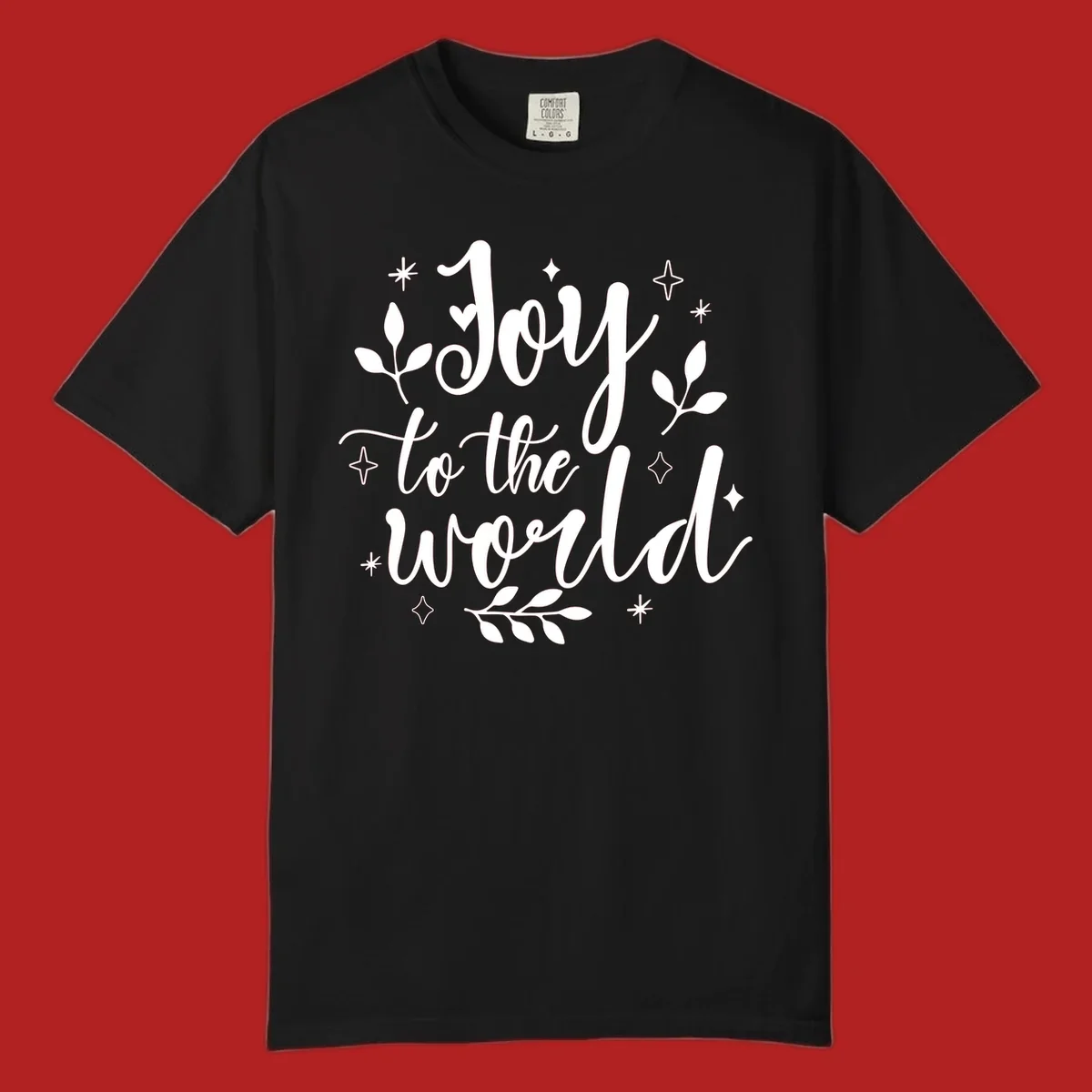 Joy to the world Christmas lettering with stars and leaves.