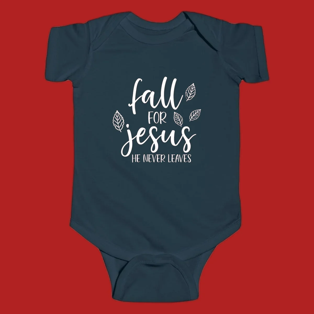 Fall for Jesus He Never Leaves text with autumn leaves design