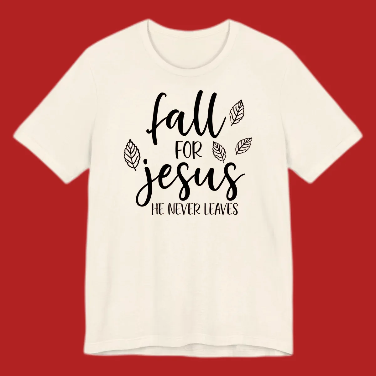 Fall for Jesus He Never Leaves text with autumn leaves design