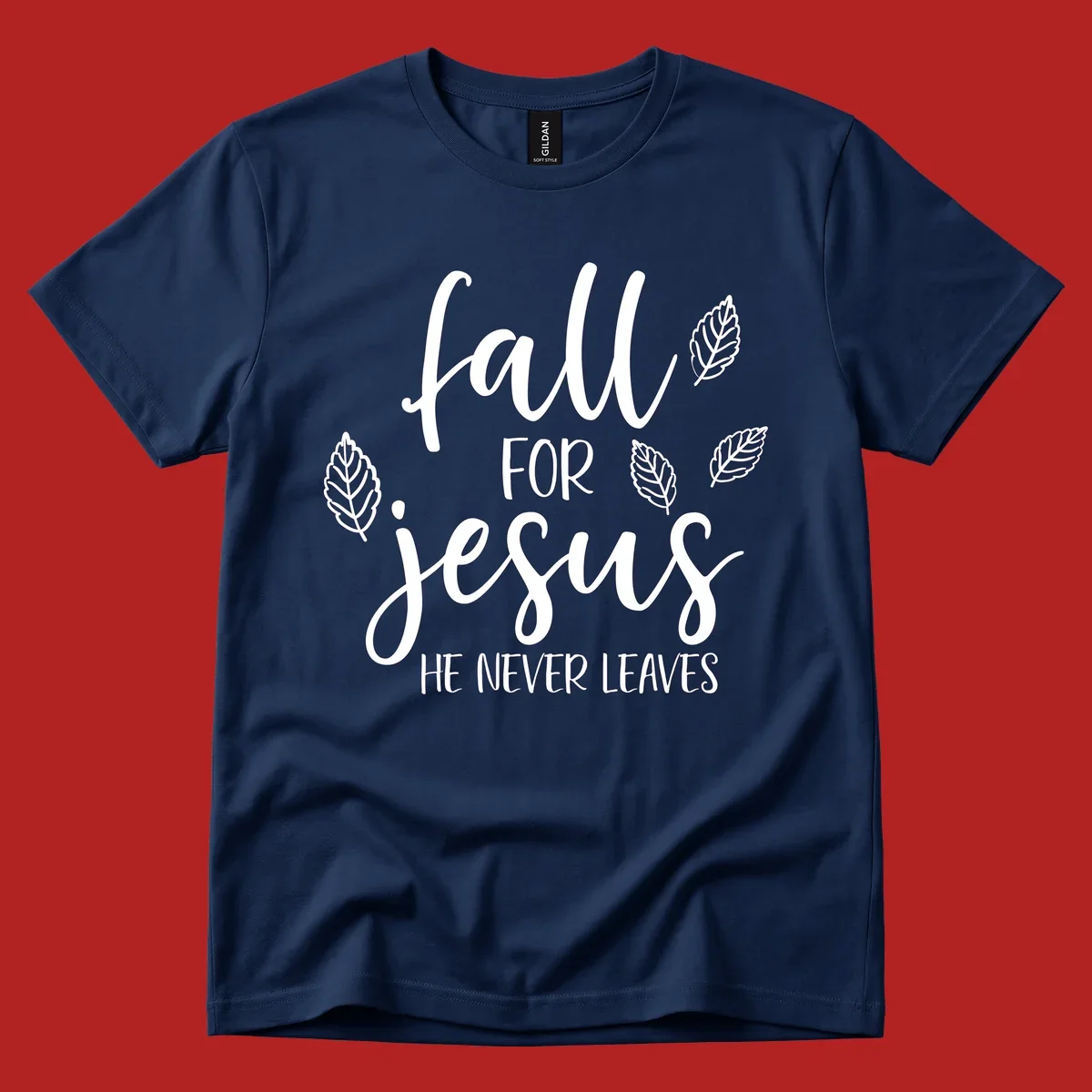 Fall for Jesus He Never Leaves text with autumn leaves design