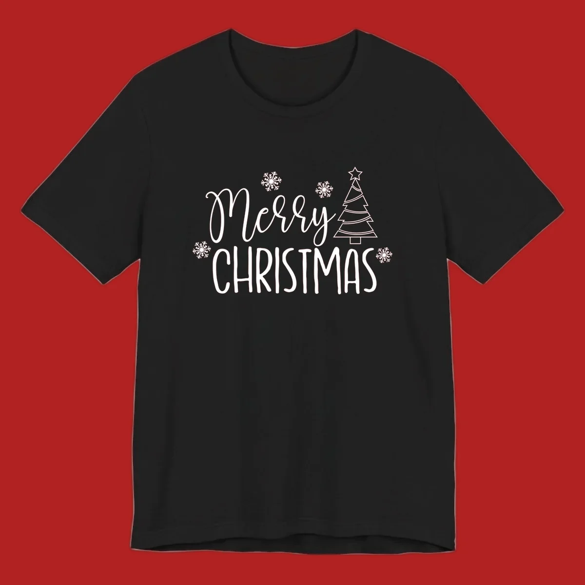 Merry Christmas script and block text with snowflakes and a Christmas tree.