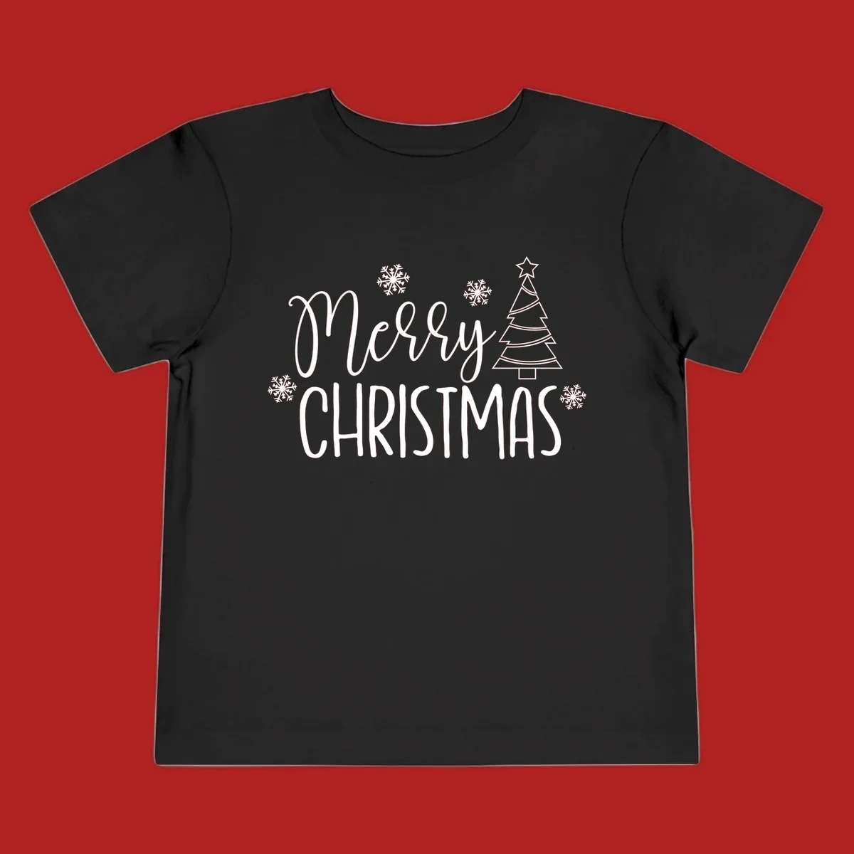Merry Christmas script and block text with snowflakes and a Christmas tree.