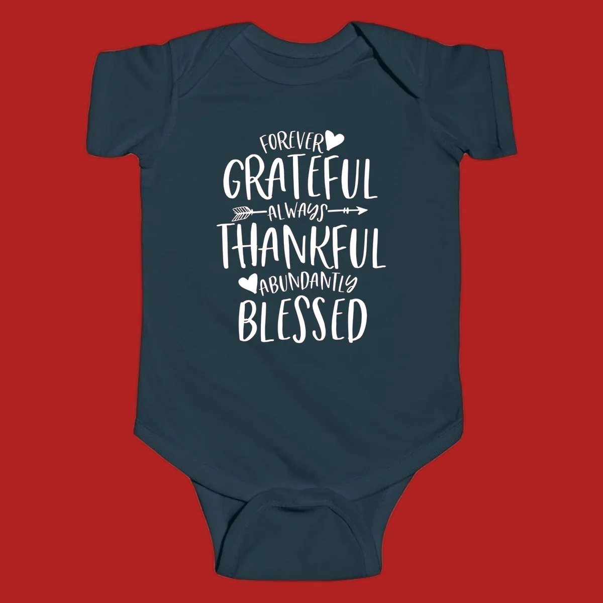 Grateful thankful blessed lettering with heart and arrow graphic