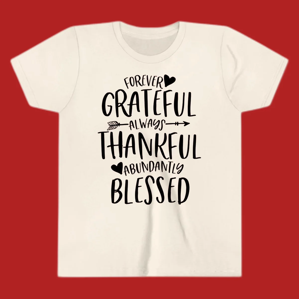 Grateful thankful blessed lettering with heart and arrow graphic