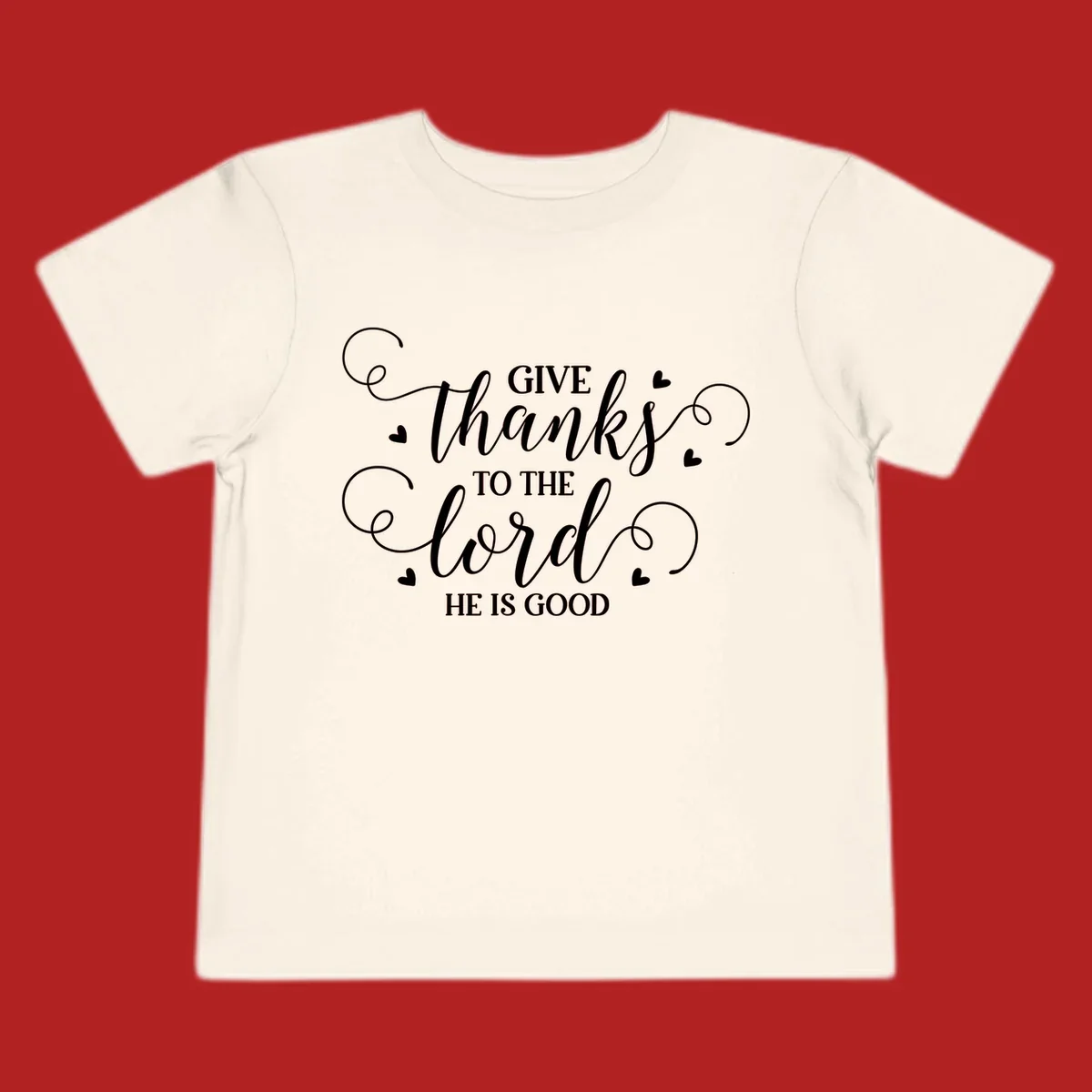 Give Thanks To The Lord Christian Typography design with white lettering and decorative hearts.