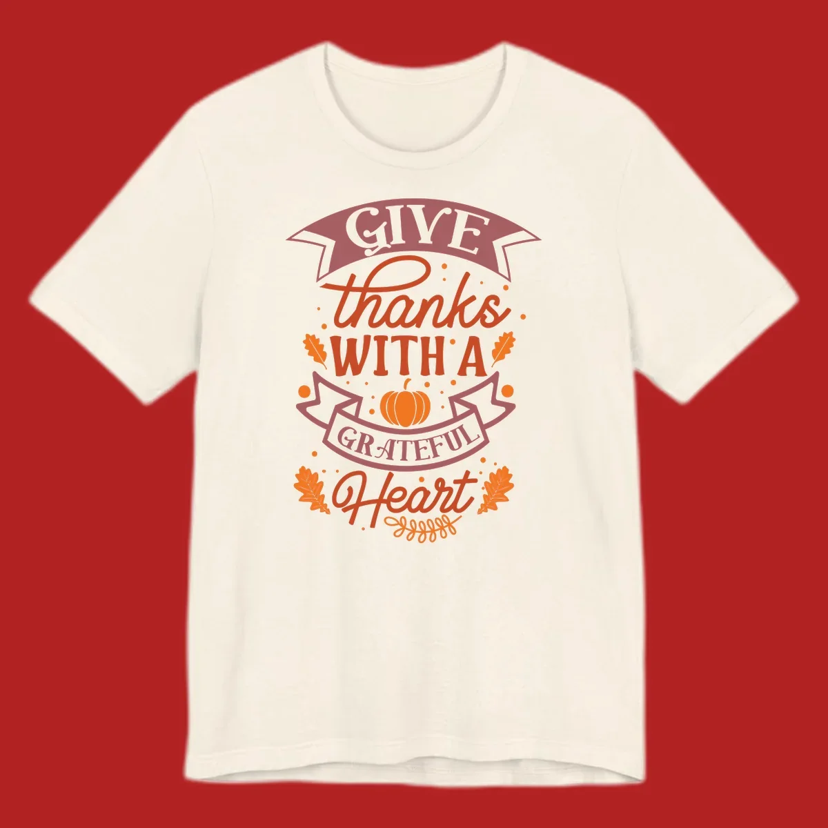 Grateful Heart Thanksgiving design with text, pumpkin, and leaves.