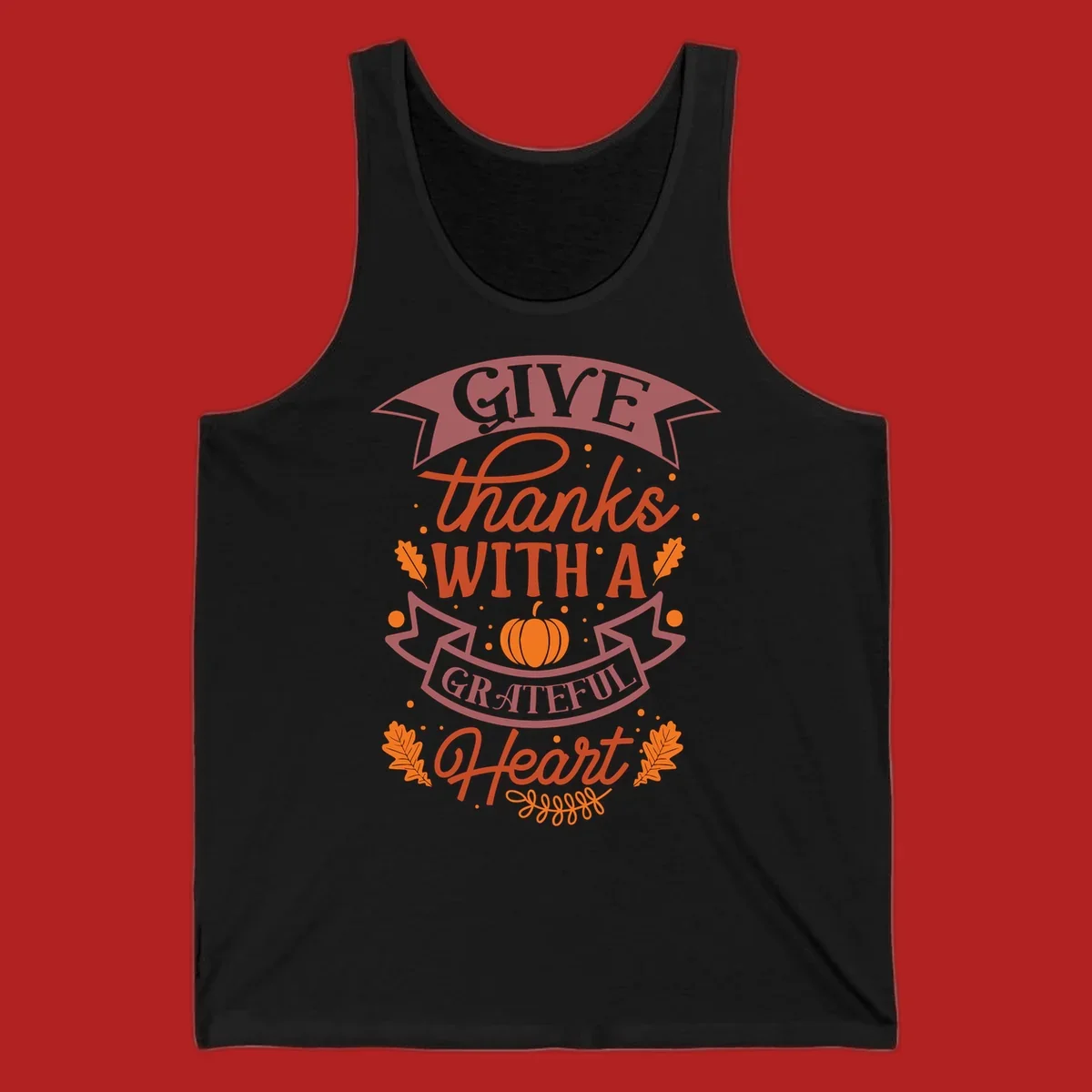 Grateful Heart Thanksgiving design with text, pumpkin, and leaves.