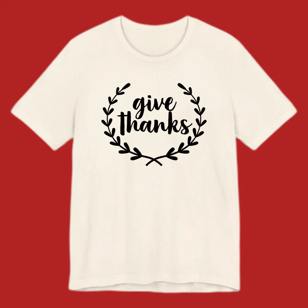 Give thanks script text inside a laurel wreath.