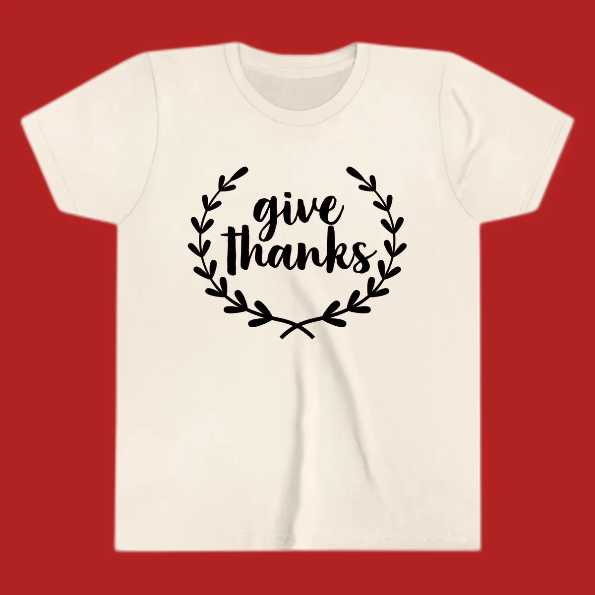 Give thanks script text inside a laurel wreath.