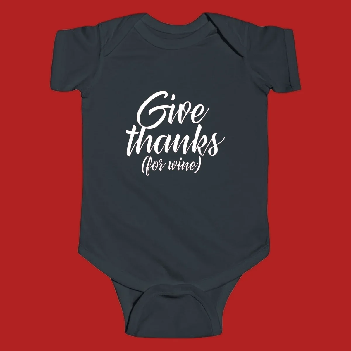 Give thanks for wine typography design with white script on black.