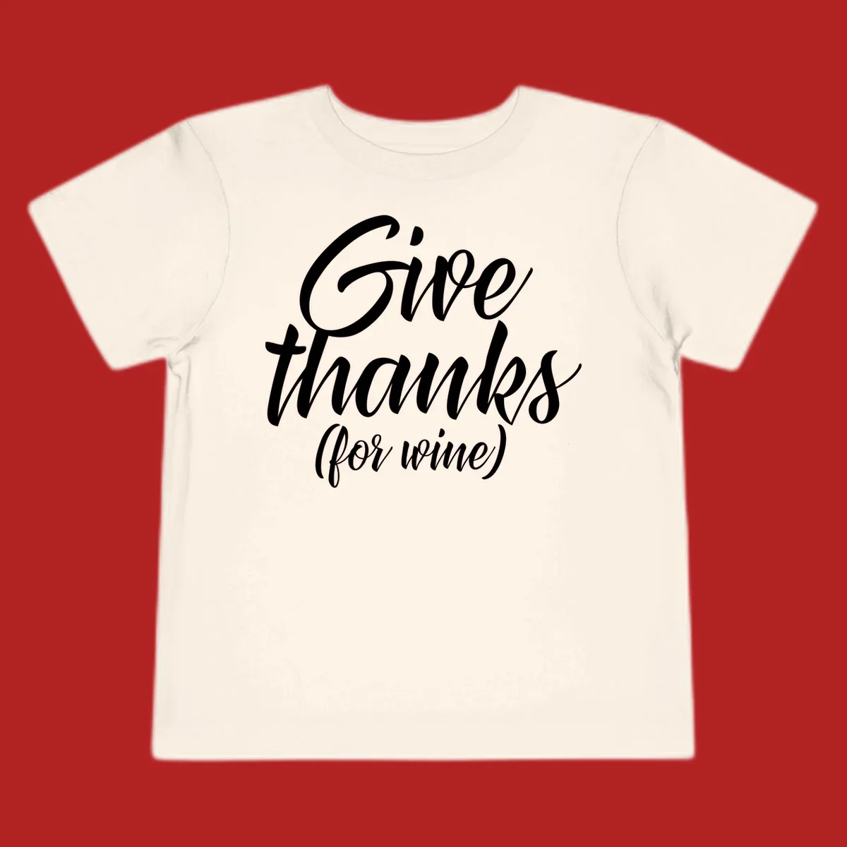 Give thanks for wine typography design with white script on black.