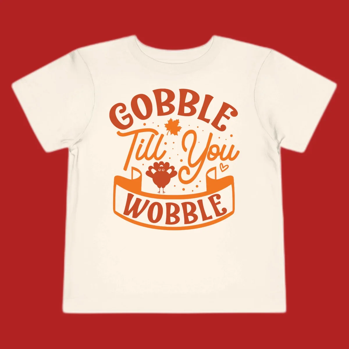 Gobble Till You Wobble Thanksgiving design with turkey illustration and text.