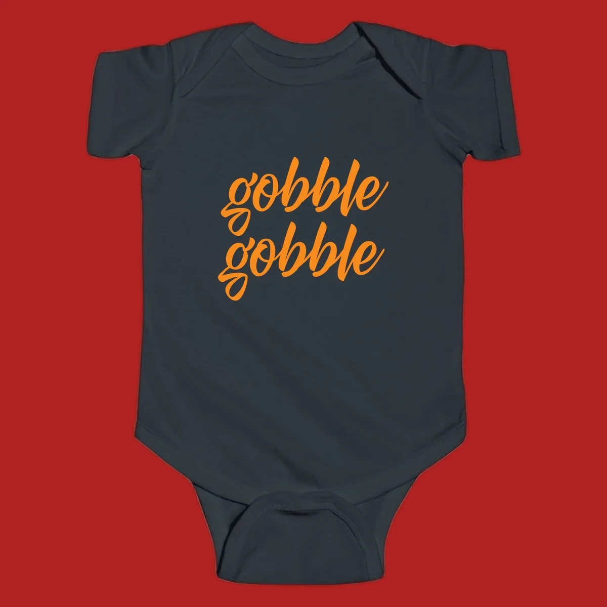 Orange script text 'gobble gobble' repeated twice. Thanksgiving phrase.