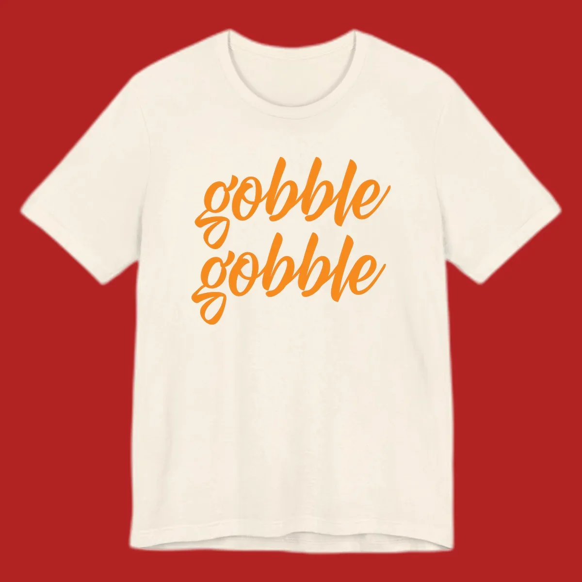 Orange script text 'gobble gobble' repeated twice. Thanksgiving phrase.