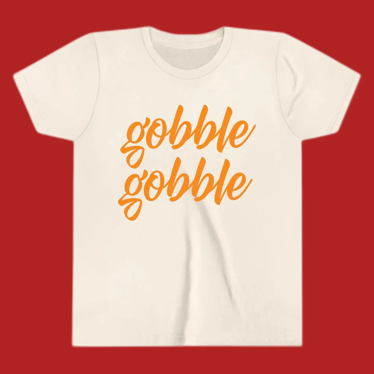Orange script text 'gobble gobble' repeated twice. Thanksgiving phrase.