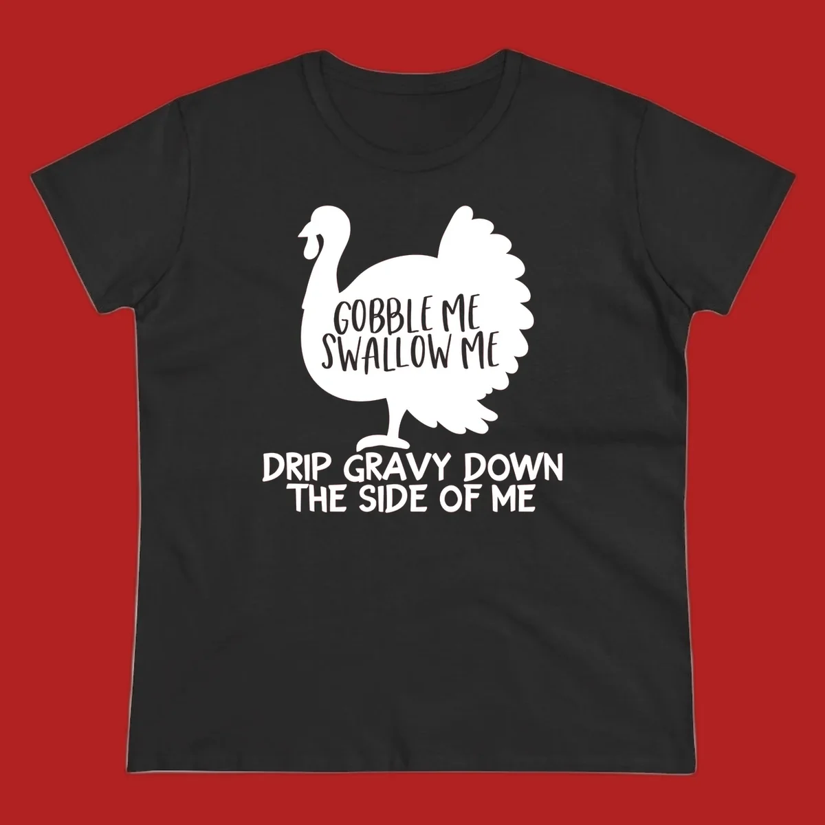 Thanksgiving turkey design with text, featuring a silhouette and the phrase 'Gobble Me Swallow Me Drip Gravy Down The Side Of Me'.
