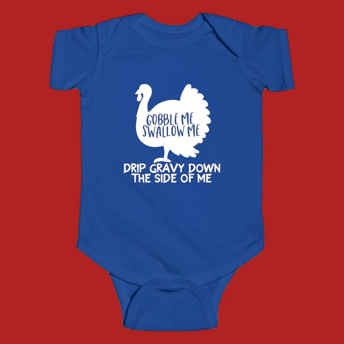 Thanksgiving turkey design with text, featuring a silhouette and the phrase 'Gobble Me Swallow Me Drip Gravy Down The Side Of Me'.