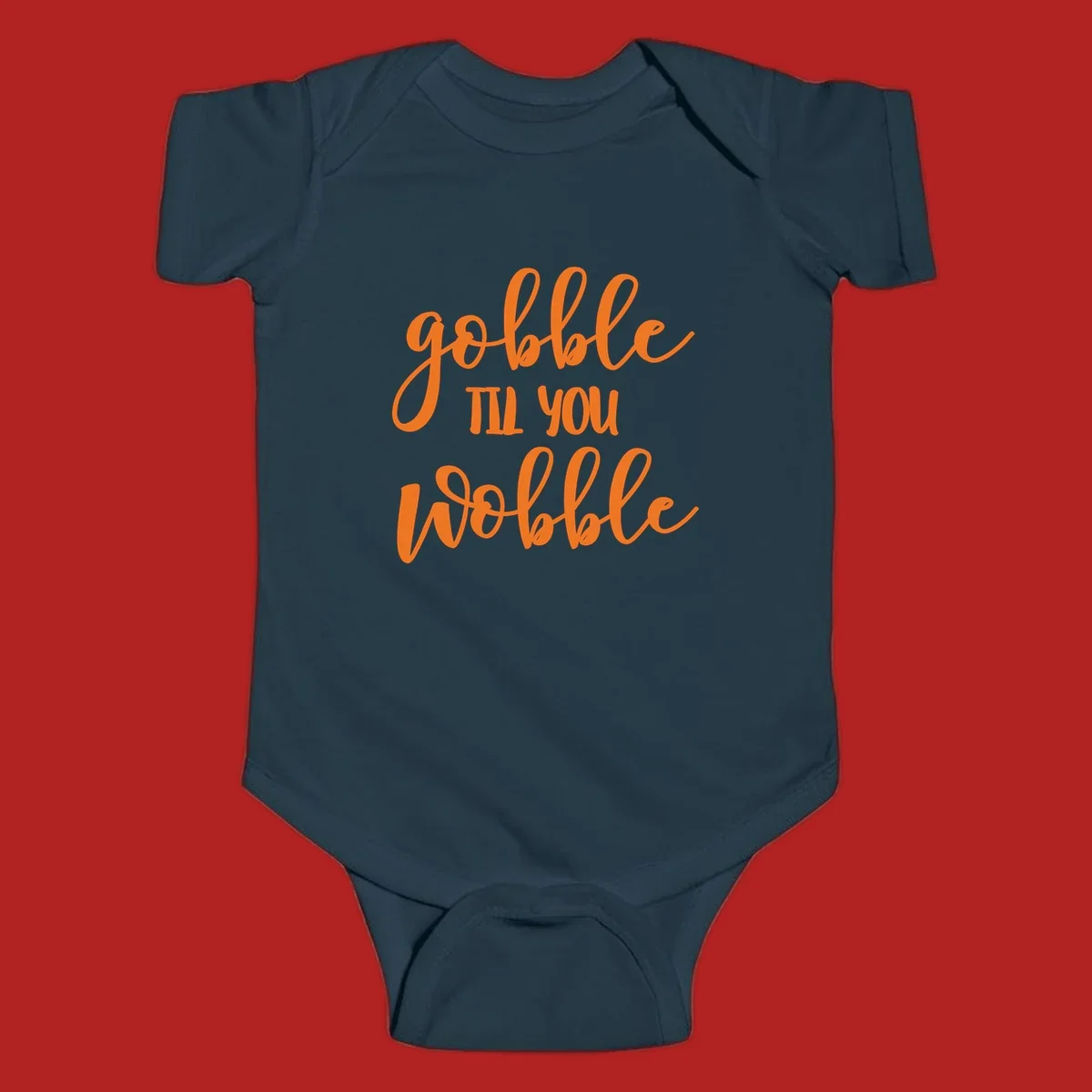 Gobble Wobble Thanksgiving phrase in orange script.