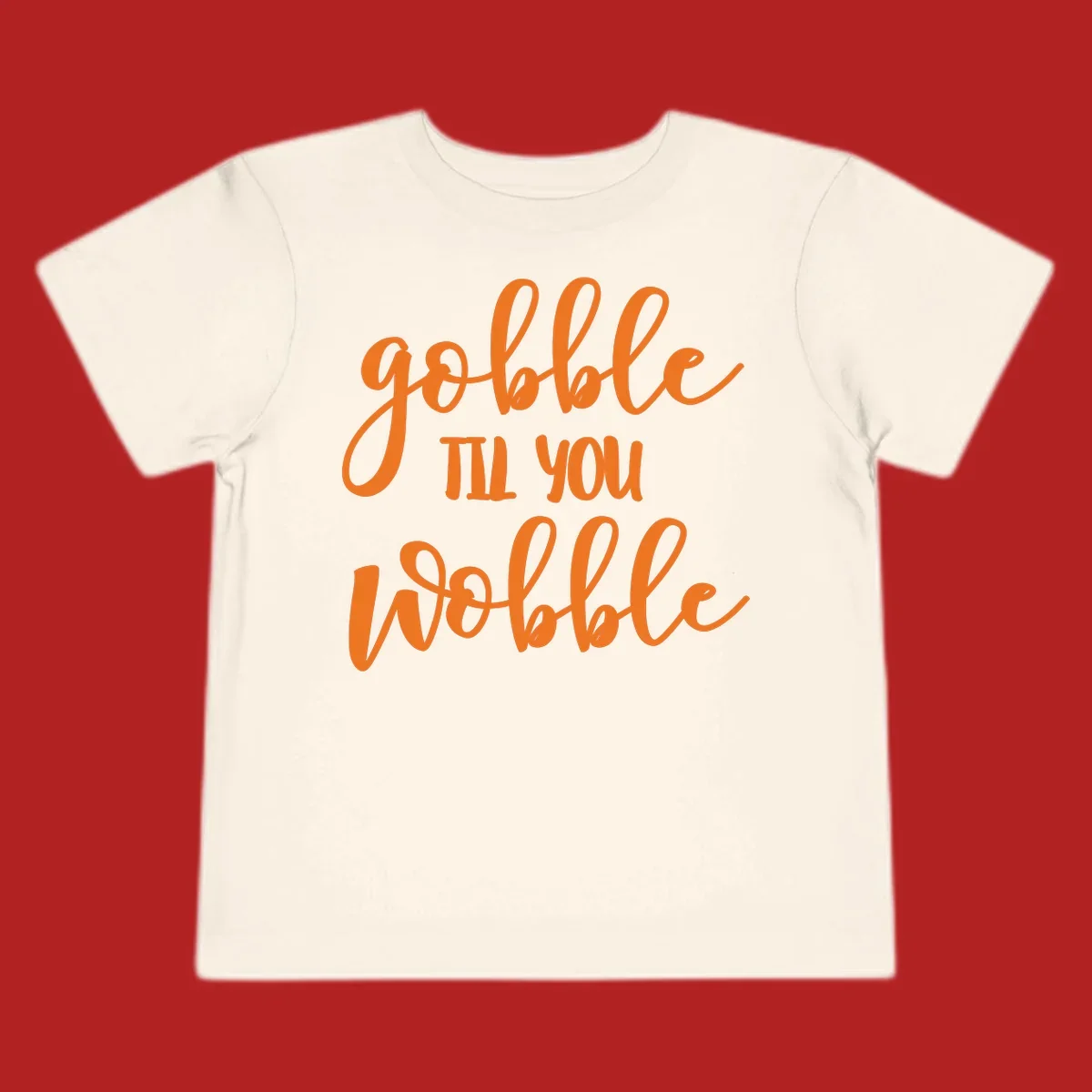 Gobble Wobble Thanksgiving phrase in orange script.