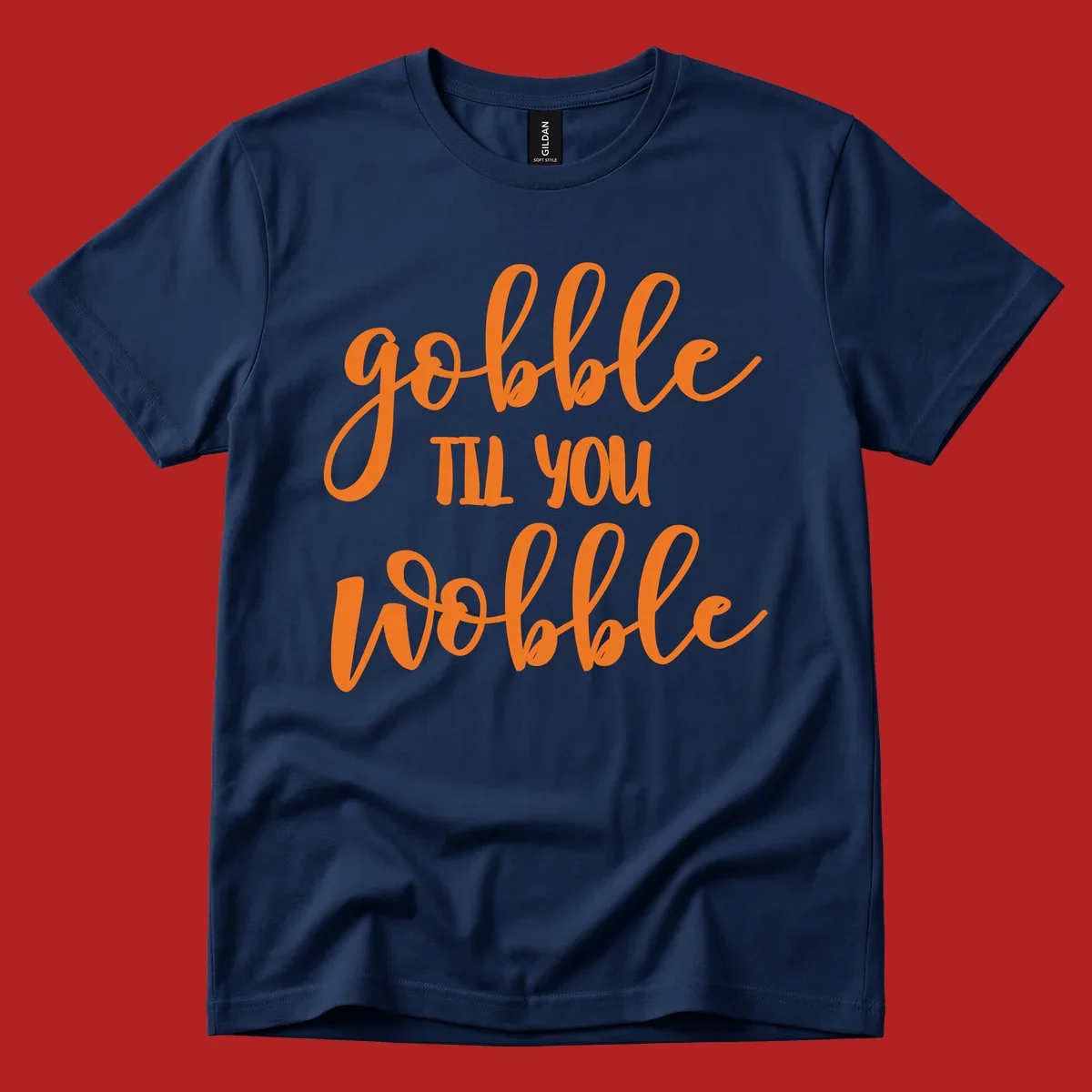 Gobble Wobble Thanksgiving phrase in orange script.