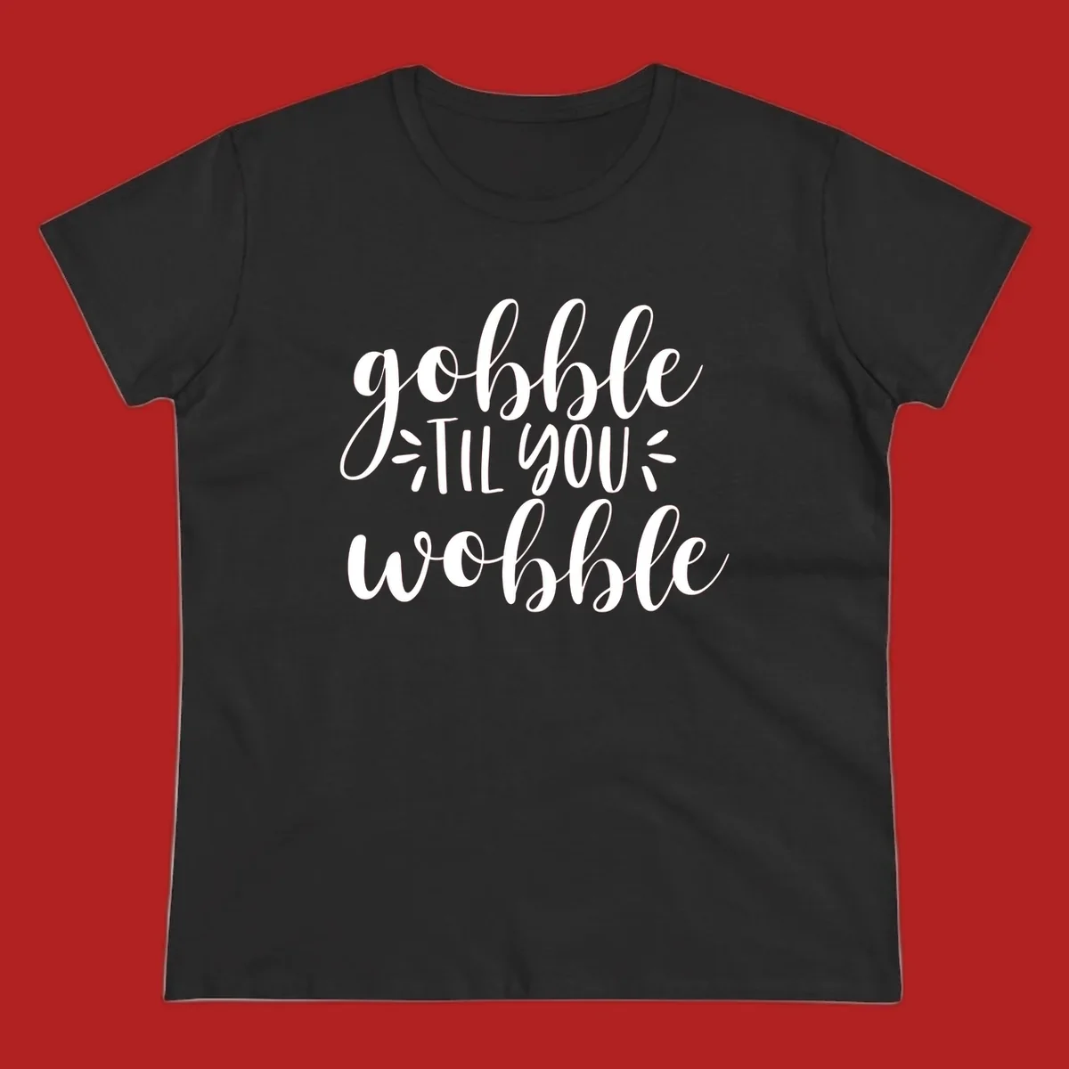 Gobble 'til you wobble thanksgiving phrase in white script font.