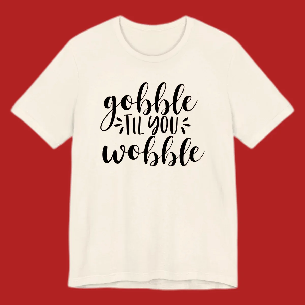 Gobble 'til you wobble thanksgiving phrase in white script font.