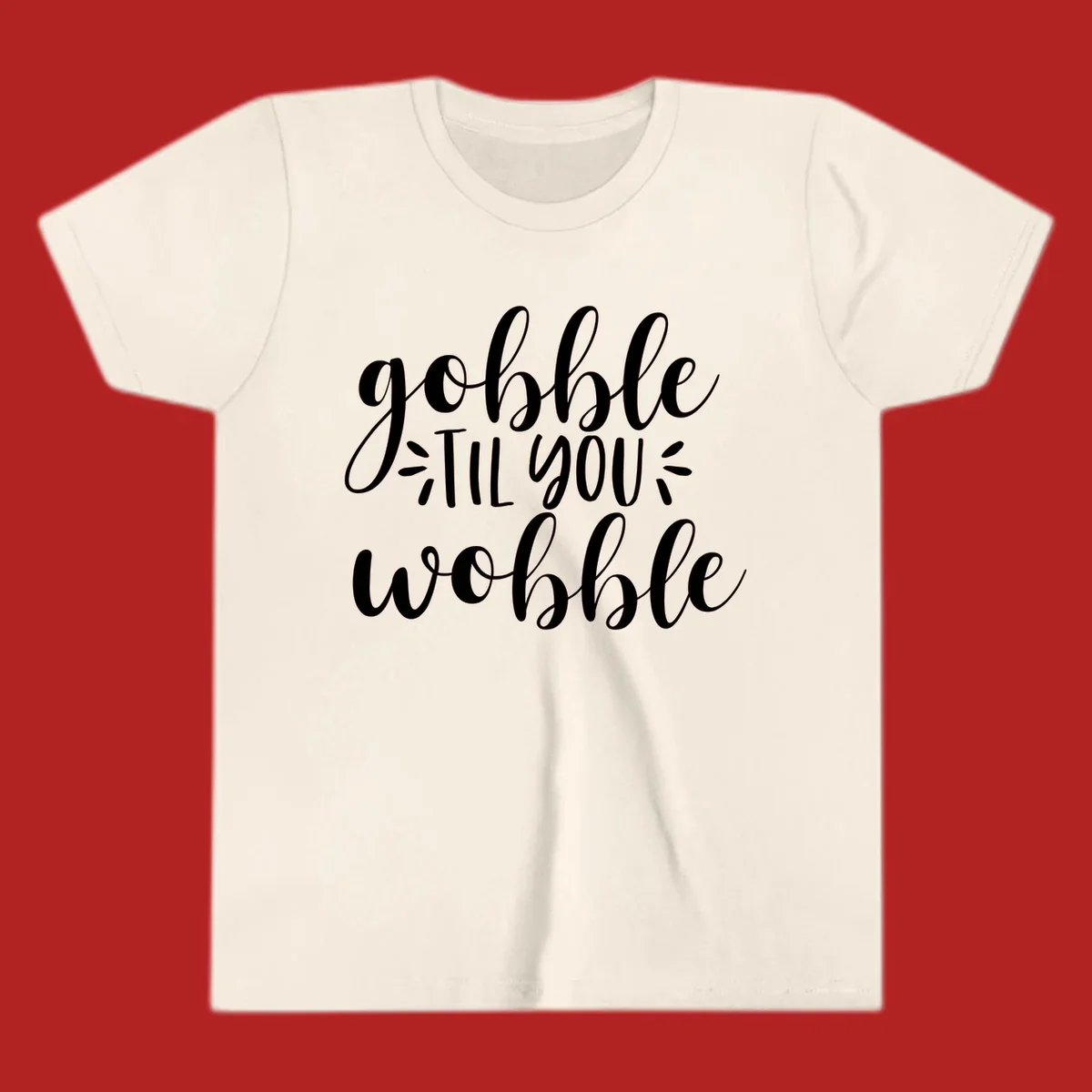Gobble 'til you wobble thanksgiving phrase in white script font.