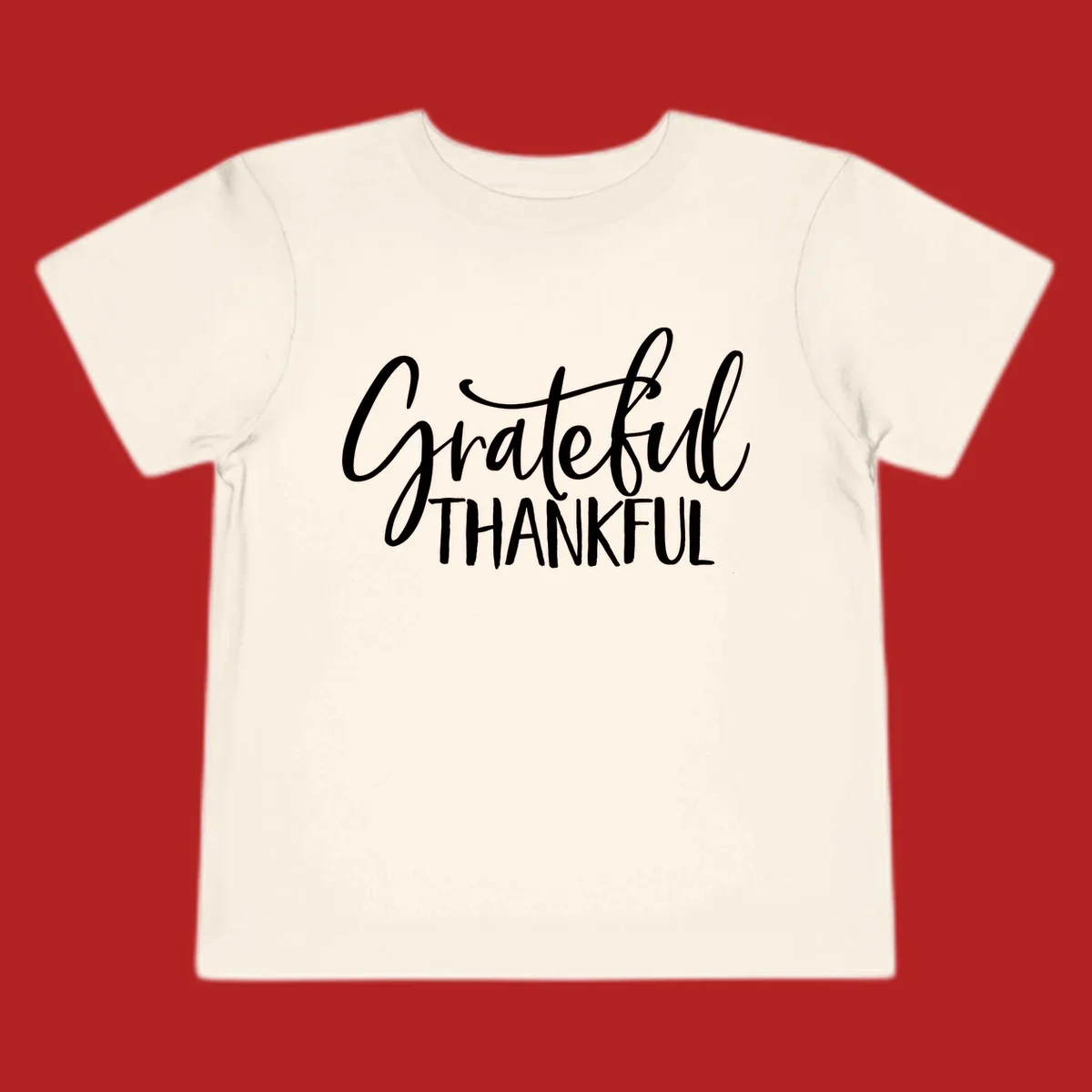 Grateful and Thankful text in white script and block fonts. grateful-thankful-script.