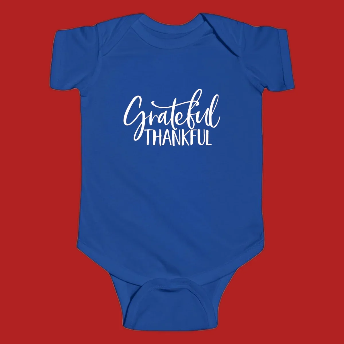Grateful Thankful typography design with white script and block text.
