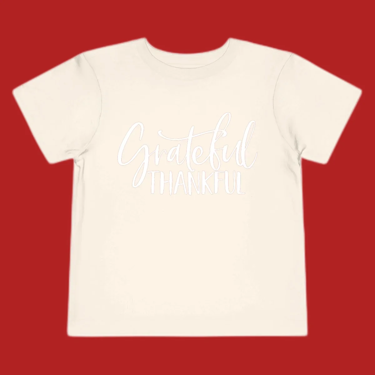 Grateful Thankful typography design with white script and block text.
