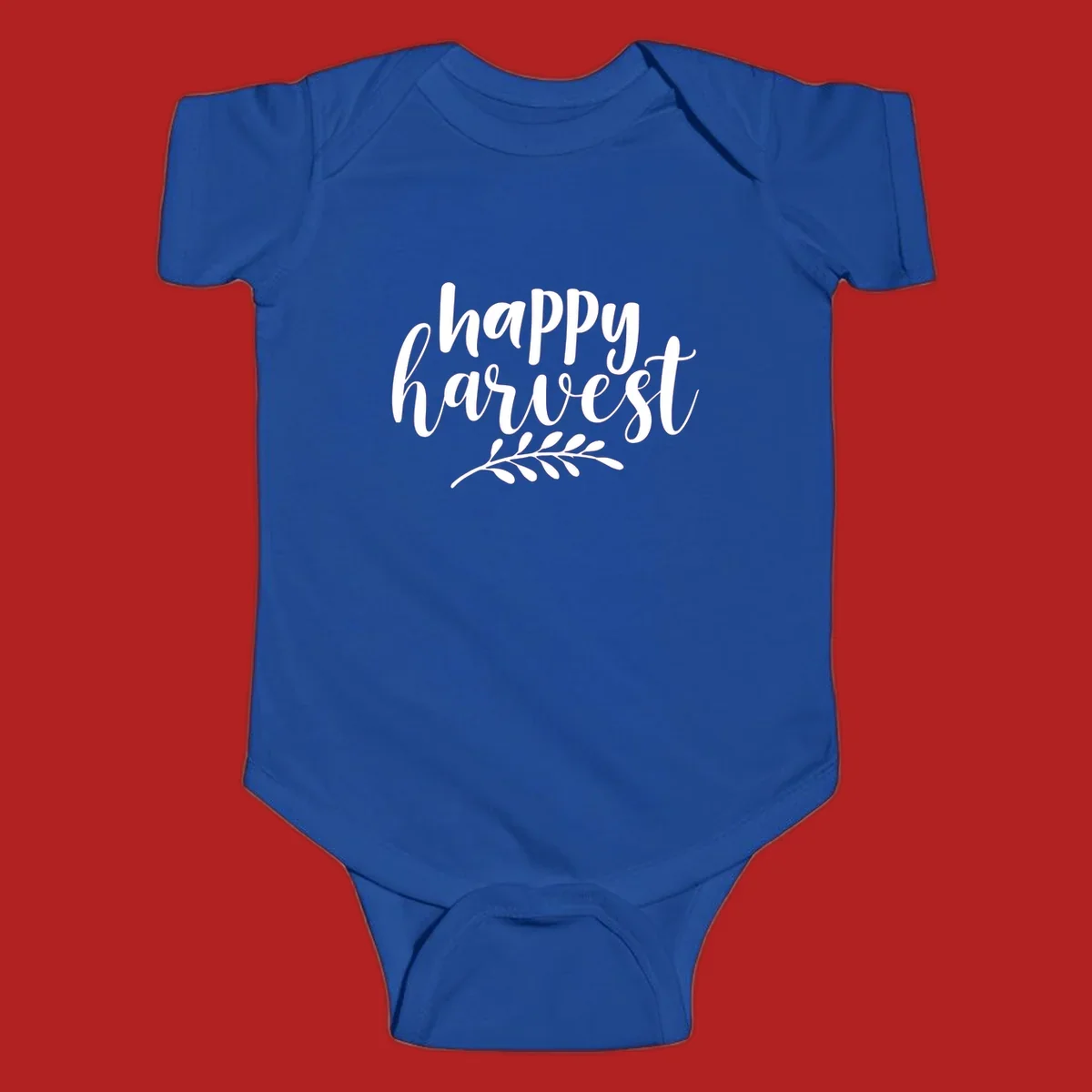 Happy Harvest text with fall leaves graphic, white on black background