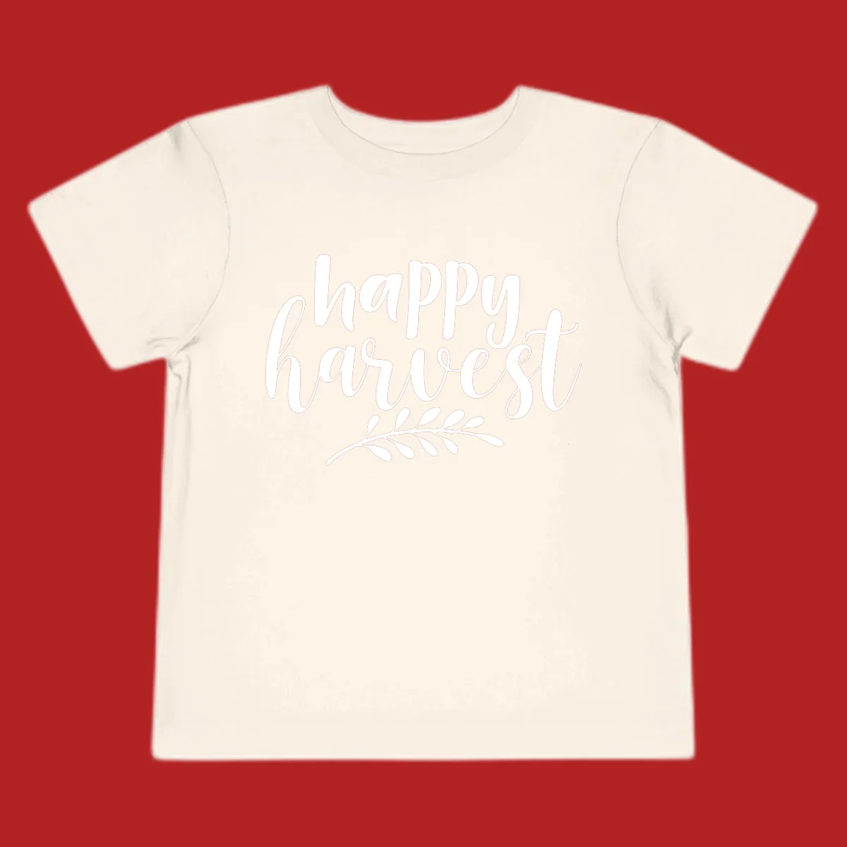 Happy Harvest text with fall leaves graphic, white on black background